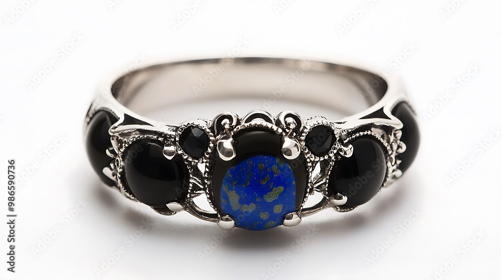 Beautiful onyx and lapis lazuli ring featuring black and deep blue gemstones in an intricate silver band Beautiful onyx and lapis lazuli ring featuring black and deep blue gemstones in an intricate silver band