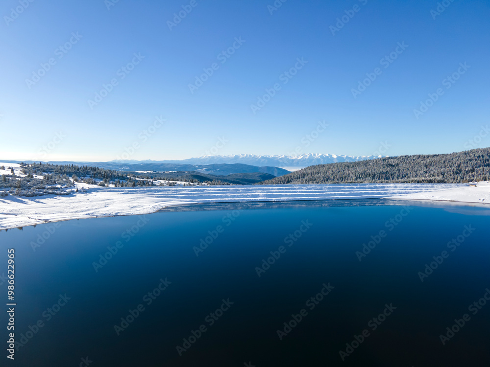 Fototapeta premium Winter view of Rila mountain near Belmeken Dam, Bulgaria