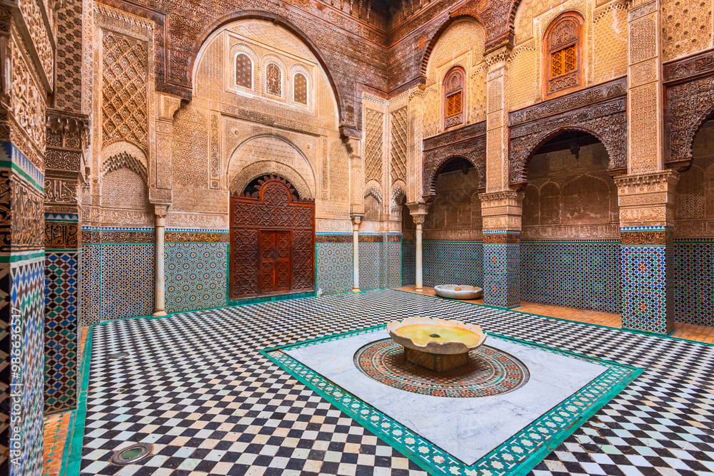 Fes, Morocco. The courtyard of Marinid Al-Attarine Madrasa of the perfumers, built in 14h Century in Fez medina.