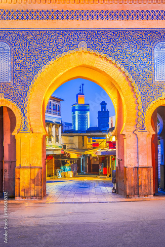 Obraz na płótnie Bab Boujeloud, Blue Gate of Fes, Minaret of Madrasa Bou Inania madrasah, Medina of Fez, Morocco w salonie