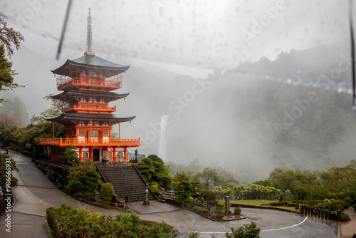 Konstfotografi Nachisan Seiganto-ji Temple’s 3-storied pagoda with Nachi Falls behind in the ra