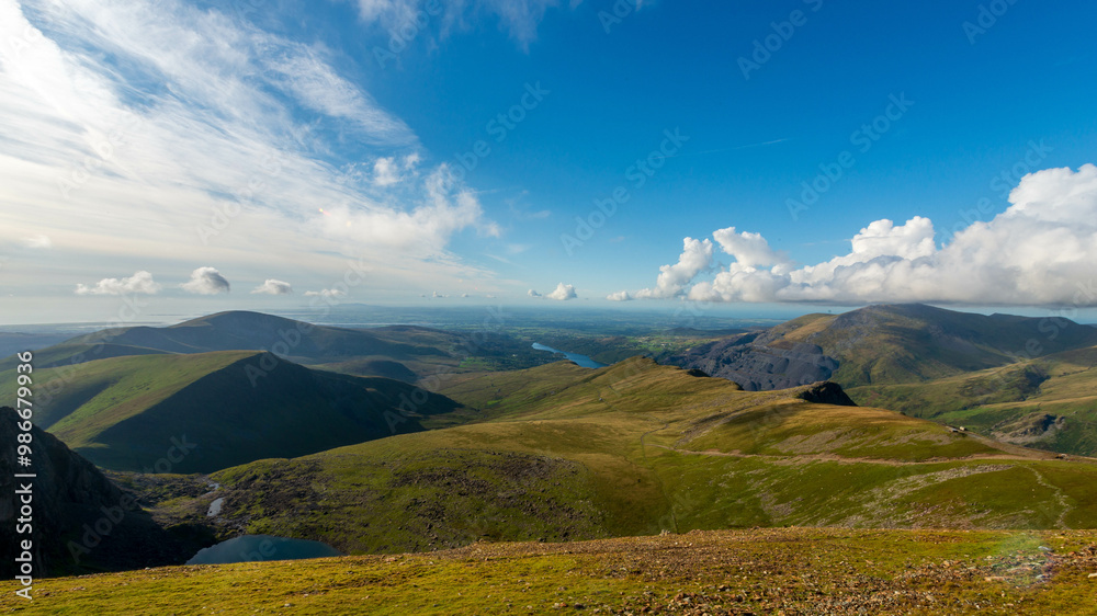 Fototapeta premium Panoramic view of the Snowdonia National Park mountains and lakes from a summit, Wales, UK.