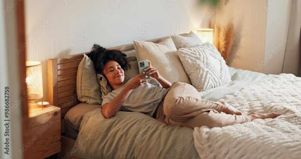 Phone, text and African woman in bed with social media, scroll and happy in morning with tech. Online, smile and home with website and post with networking app in bedroom with relax and calm break Phone, text and African woman in bed with social media, scroll and happy in morning with tech. Online, smile and home with website and post with networking app in bedroom with relax and calm break