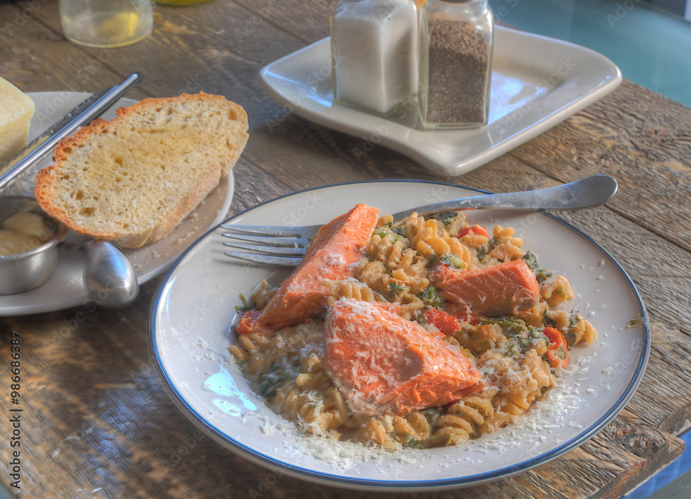 Side view of salmon pasta dish Side view of salmon pasta dish