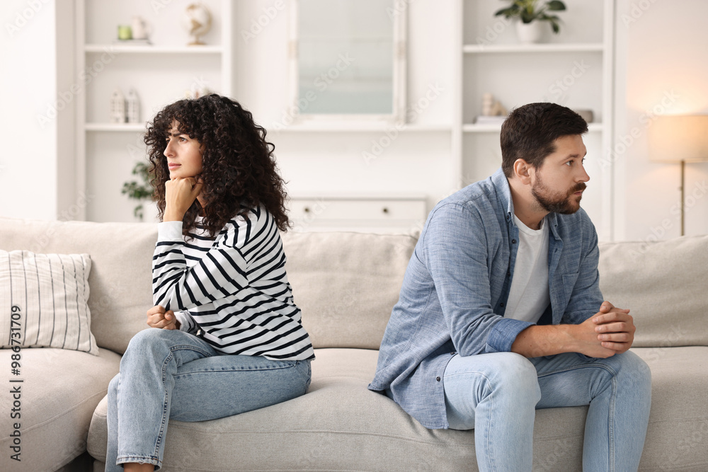 Couple having quarrel on sofa at home. Relationship problems Couple having quarrel on sofa at home. Relationship problems