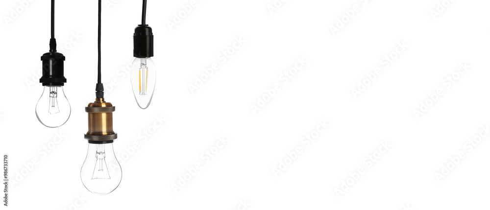 Different incandescent light bulbs on white background, space for text Different incandescent light bulbs on white background, space for text