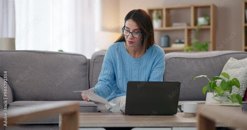 Woman, web and laptop for business email on living room table sitting on sofa at home. Creative female employee, remote work and computer for online research, project proposal or idea document Woman, web and laptop for business email on living room table sitting on sofa at home. Creative female employee, remote work and computer for online research, project proposal or idea document