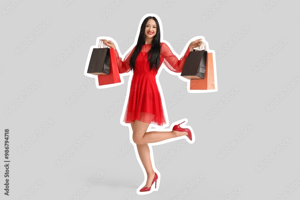 Beautiful stylish woman with shopping bags on light background. Black Friday Sale