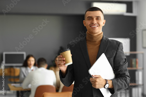 Businessman with cup of cof...