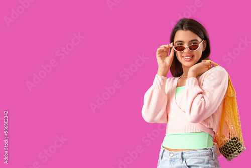 Beautiful young woman with ...