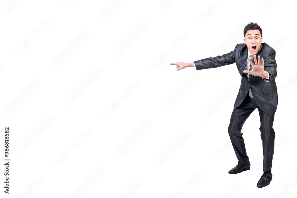 Shocked man in suit pointing aside. White background. Shocked man in suit pointing aside. White background.