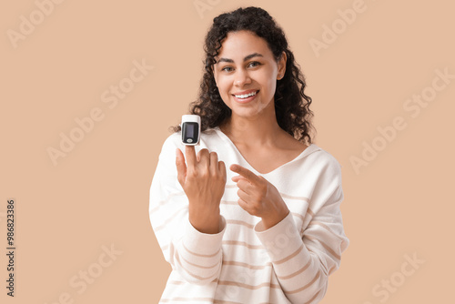 African-American woman chec...