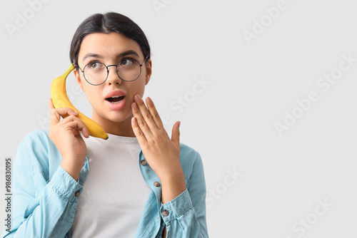 Surprised young woman with ...