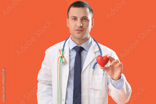 Male physician with ribbon ...