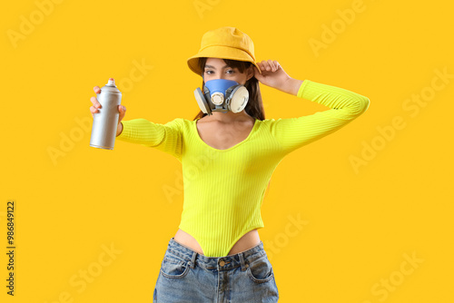 Young girl in respirator an...