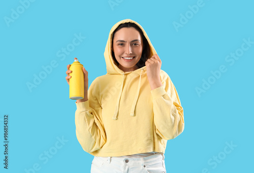 Young woman with spray pain...
