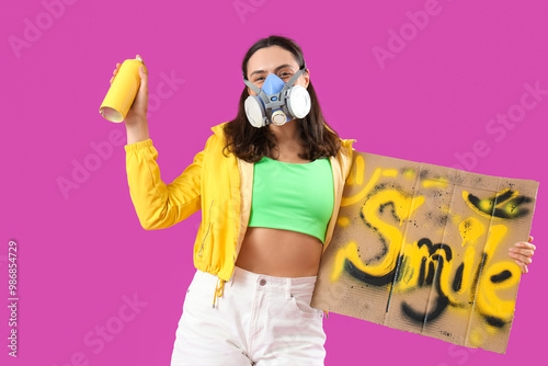 Young woman in respirator w...