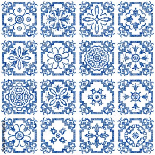 Watercolor seamless pattern of blue tiles with white geometrical and floral ornaments 