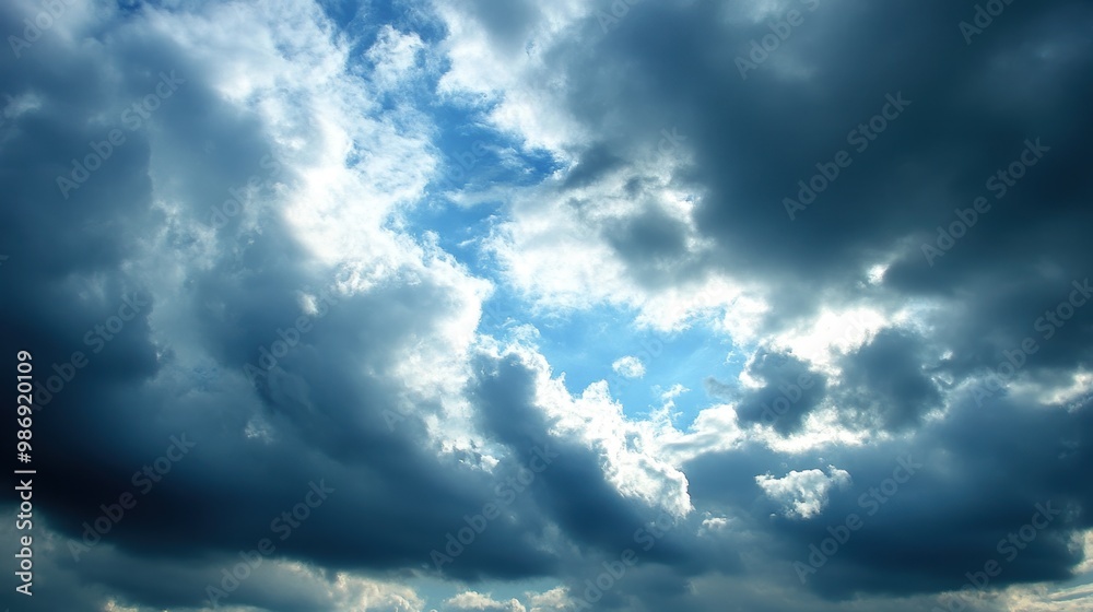 Calming Release - Moody sky with dark clouds moving away symbolizing letting go of anger and finding peace. Calming Release - Moody sky with dark clouds moving away symbolizing letting go of anger and finding peace.