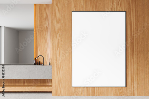 Wooden home bathroom interior with sink and mock up frame on wooden wall