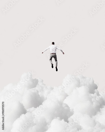 Wallpaper Mural Minimalist Businessman Leaping Over Clouds in Symbolic Jump for Success Torontodigital.ca