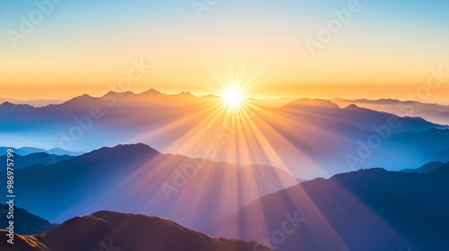 A stunning sunrise over mountain peaks, casting rays of light into a serene sky, creating a tranquil and picturesque landscape. photo