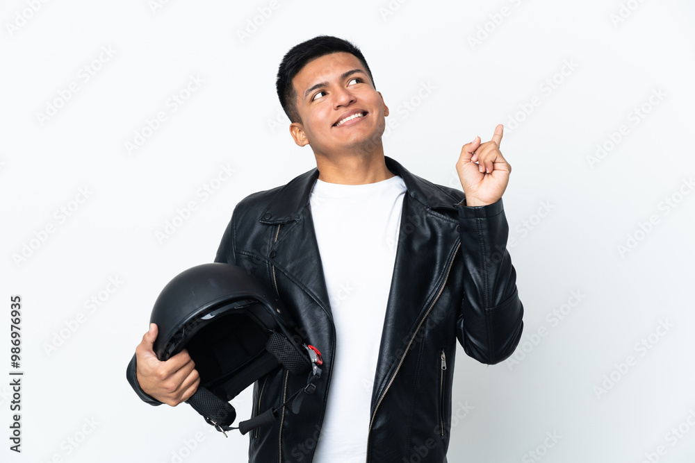 Ecudorian man with a motorcycle helmet isolated on white background pointing up a great idea Ecudorian man with a motorcycle helmet isolated on white background pointing up a great idea