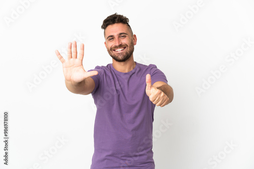 Caucasian man isolated on white background counting six with fingers