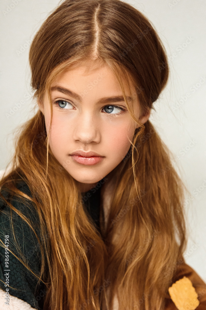 Portrait of a beautiful 7 years old girl. Close-up, studio. Portrait of a beautiful 7 years old girl. Close-up, studio.