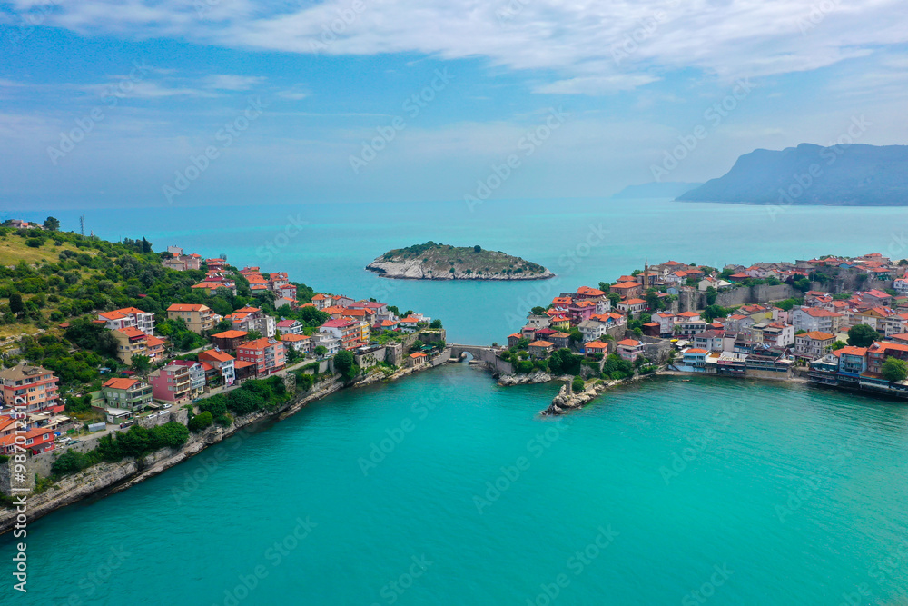 Fototapeta premium Beautiful cityscape on the mountains over Black-sea, Amasra. Amasra traditional Turkish architecture