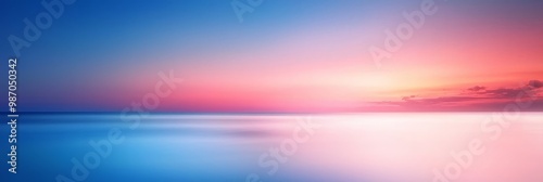 A boat dots the body of water as a radiant sun sinks into the horizon, surrounded by clouds in the sky