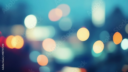 Abstract bokeh background with warm and cool tones, creating a vibrant and colorful scene.