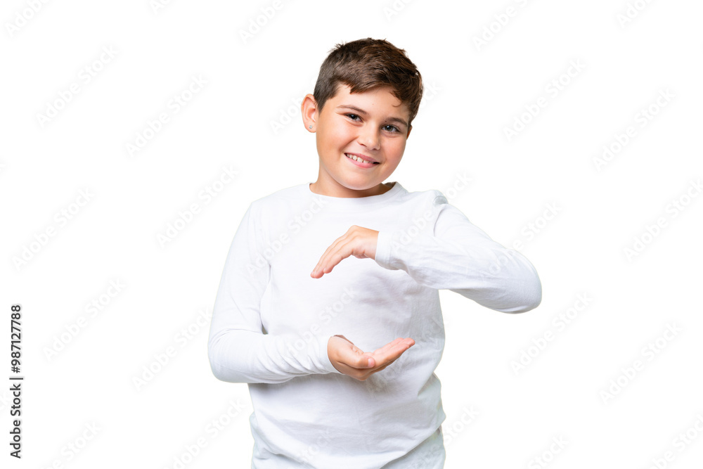 Little caucasian kid over isolated chroma key background holding copyspace imaginary on the palm to insert an ad Little caucasian kid over isolated chroma key background holding copyspace imaginary on the palm to insert an ad