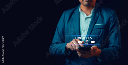 Obraz na płótnie Businessman touching on virtual screen contact icons (email, address, live chat, telephone). Contact us or Customer support hotline, Customer service, helpdesk advice online support w salonie