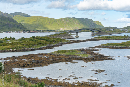 Swamp lakes with road and high bridges throuh them, Lofoten Norway photo