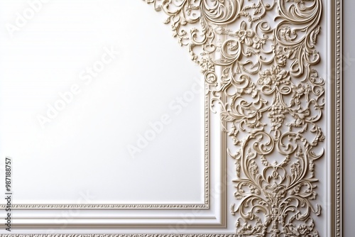 Elegant white wall with intricate floral plasterwork designs. photo