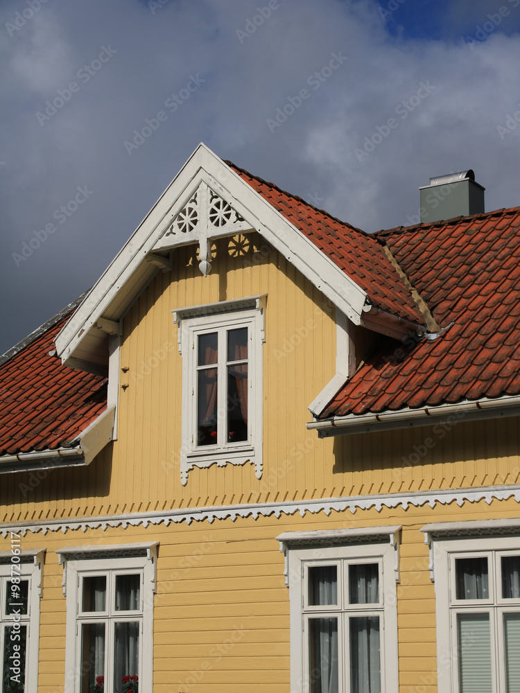 Beautiful ornated gable of a timber house in Egersund, Norway. Beautiful ornated gable of a timber house in Egersund, Norway.