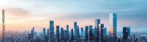 A stunning panoramic view of a modern city skyline at sunset, showcasing impressive skyscrapers and vibrant colors.