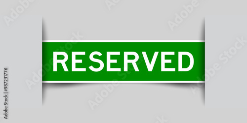 Green color square label sticker with word reserved that inserted in gray background