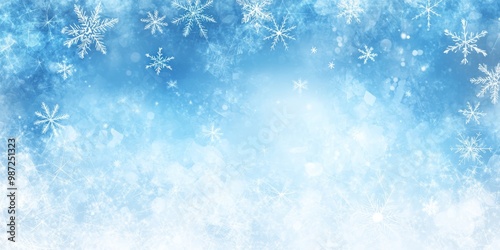 Delicate snowflakes float gracefully against a tranquil blue backdrop, creating a peaceful winter atmosphere