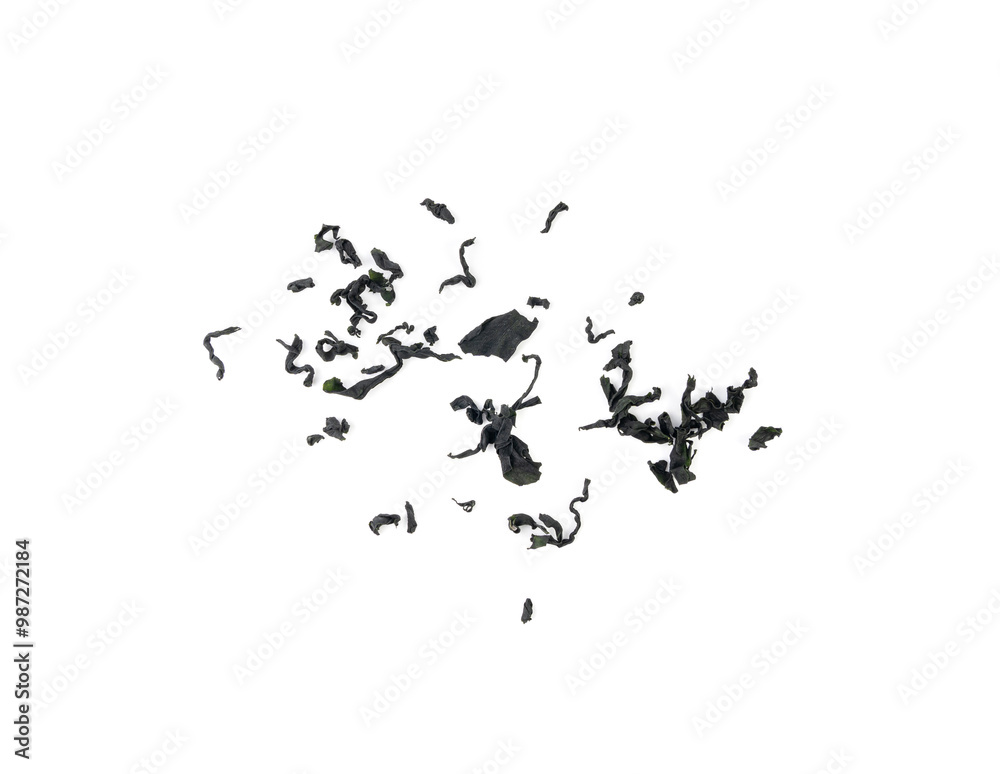 Wakame seaweed pieces isolated, edible raw algae, dry undaria pinnatifida healthy food kelp Wakame seaweed pieces isolated, edible raw algae, dry undaria pinnatifida healthy food kelp