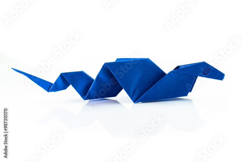 2025 New Year with true paper snake. Animal reptile concept origami isolated on white background with reflection