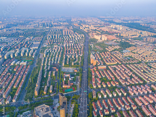 Aerial view of Shanghai Downtown skyline, highway roads or street . Financial district and business area in smart urban city. Skyscraper and high-rise buildings in sunny day