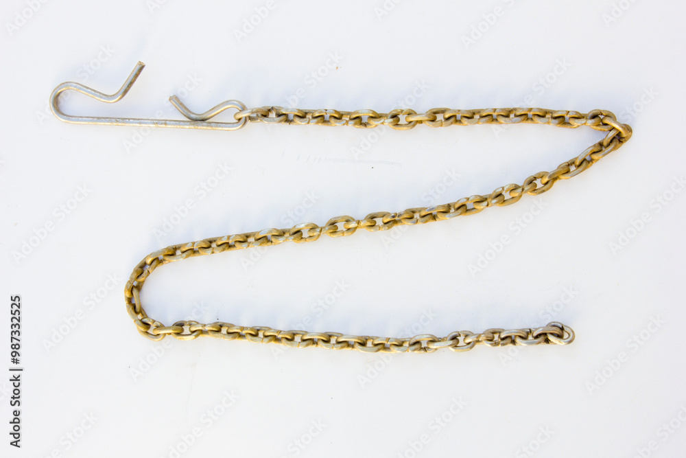 A small iron chain and a hook. This chain and hook can be used to hook items or as a necklace or jewelry. A small iron chain and a hook. This chain and hook can be used to hook items or as a necklace or jewelry.