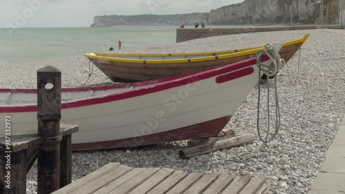 Colourful boats on the beach at Yport photo