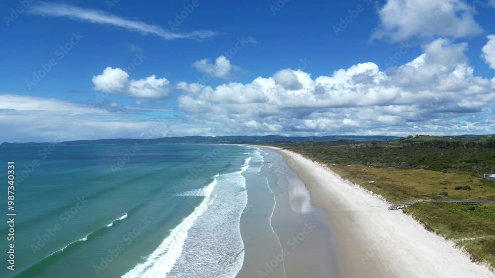 4K drone footage. Flying over white sands of Langs Beach, Whangarei, New Zealand.
