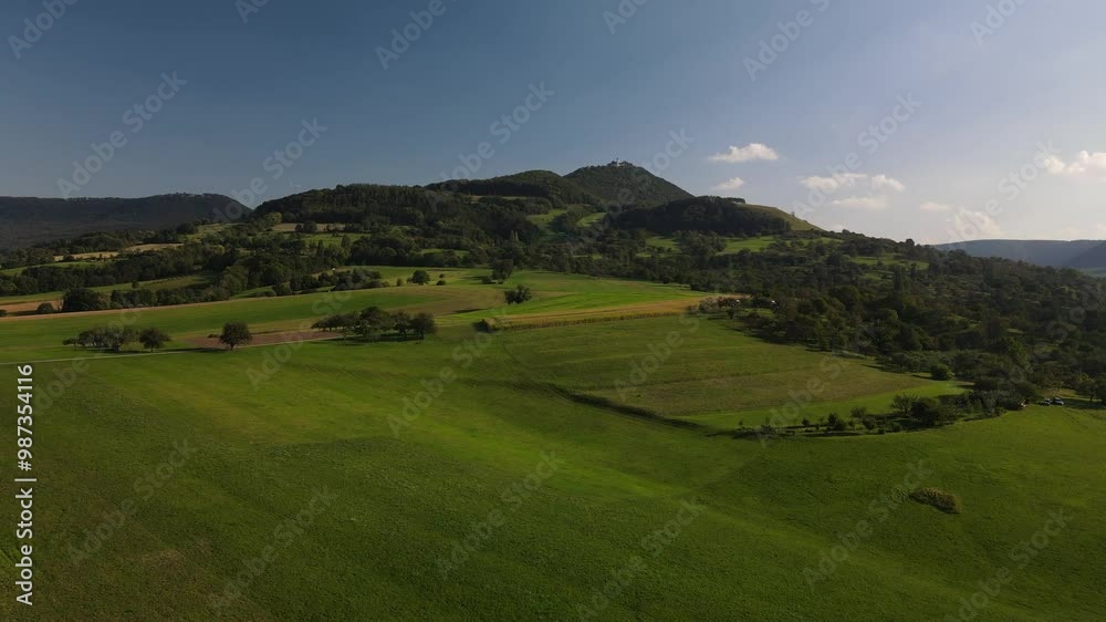 A flight above Dettingen Teck towards the Castle Teck which is located high above the mountain A flight above Dettingen Teck towards the Castle Teck which is located high above the mountain