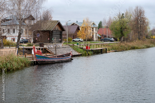 Suzdal. Vladimir region, Russia. An ancient ship in the form of a rook on a pier on the Kamenka River