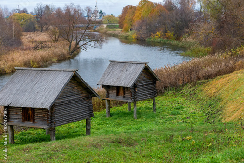 Barn on stilts on an autumn cloudy day. Suzdal. Vladimir region, Russia