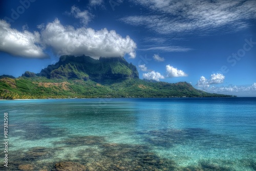 The French Polynesian island of Bora Bora is like a tropical paradise, with Mount Otemanu rising above a clear lagoon. photo